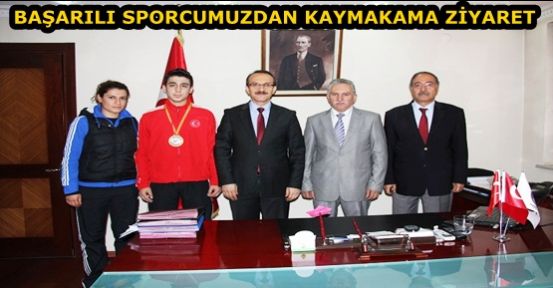 BAŞARILI SPORCUMUZDAN KAYMAKAMI YAVUZ'U ZİYARET ETTİ!