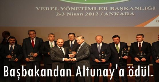 Başbakandan Altunay'a ödül.