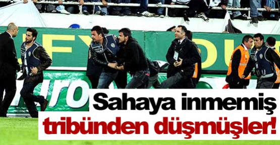 Sahaya inmemiş, tribünden düşmüşler